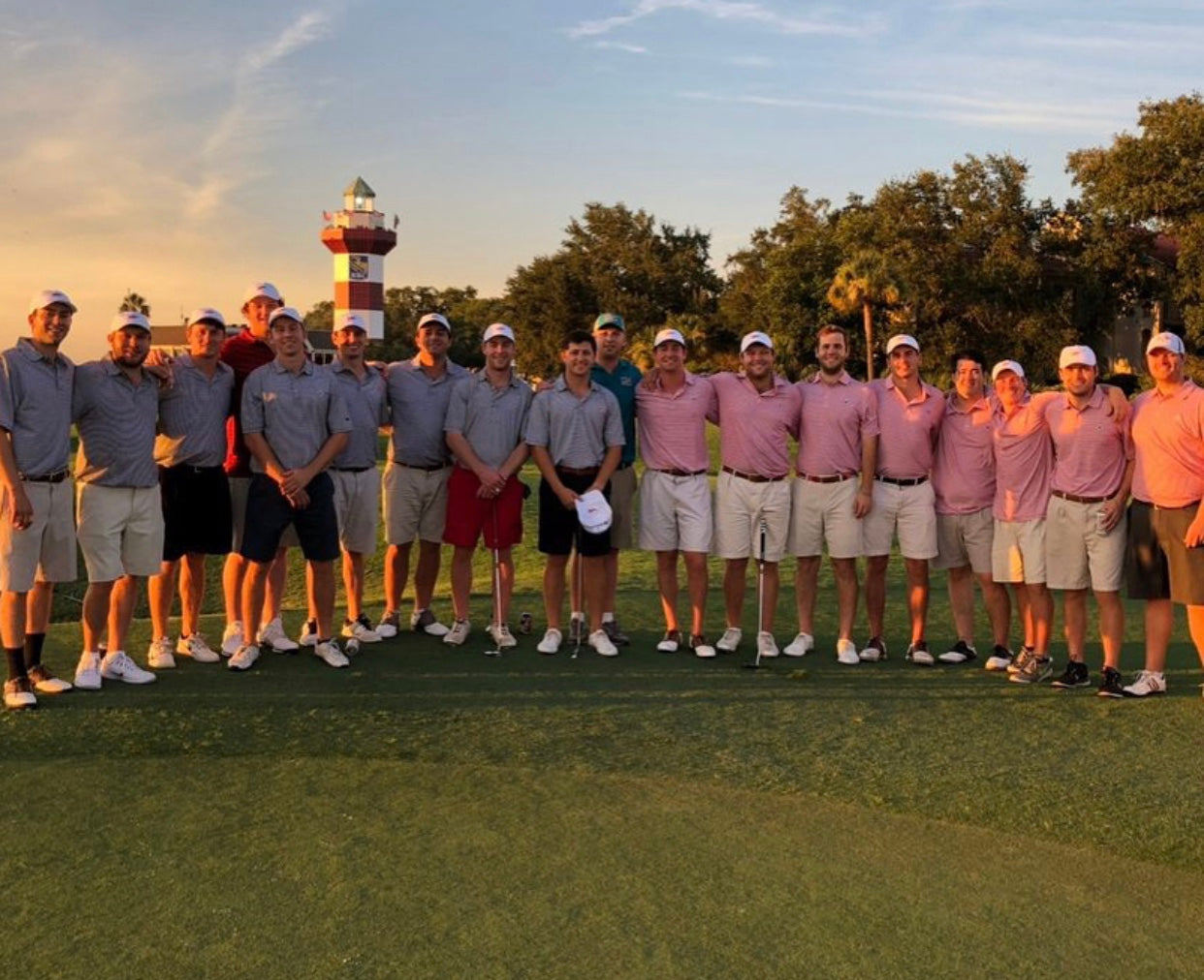 Golf teams posing in custom Onward Reserve polos